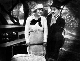 Edna Purviance and Charlie Chaplin