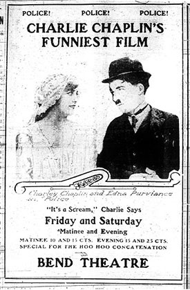 Edna Purviance and Charlie Chaplin in Police