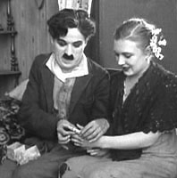 Charlie Chaplin and Edna Purviance in Sunnyside