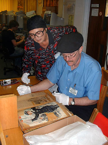 looking at Edna's scrapbook